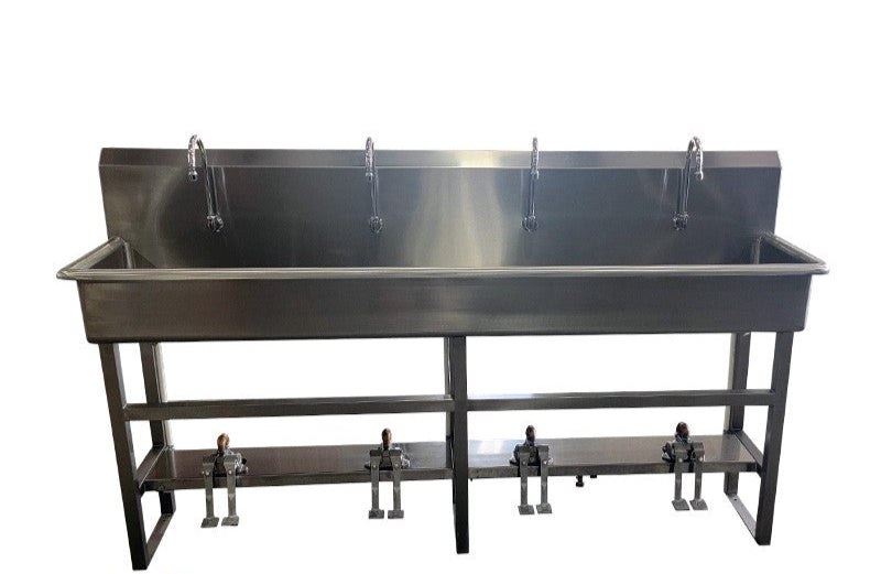 4-station stainless steel foot pedal sink with individual hot, cold, and mixed water valves, USA made.