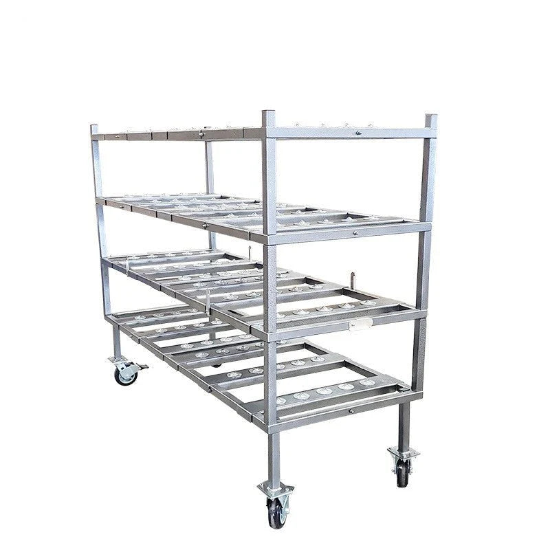 HD 1000 Lift positioned beside stainless steel mortuary racking system inside insulated morgue cooler, built in Johnson City, Tennessee.
