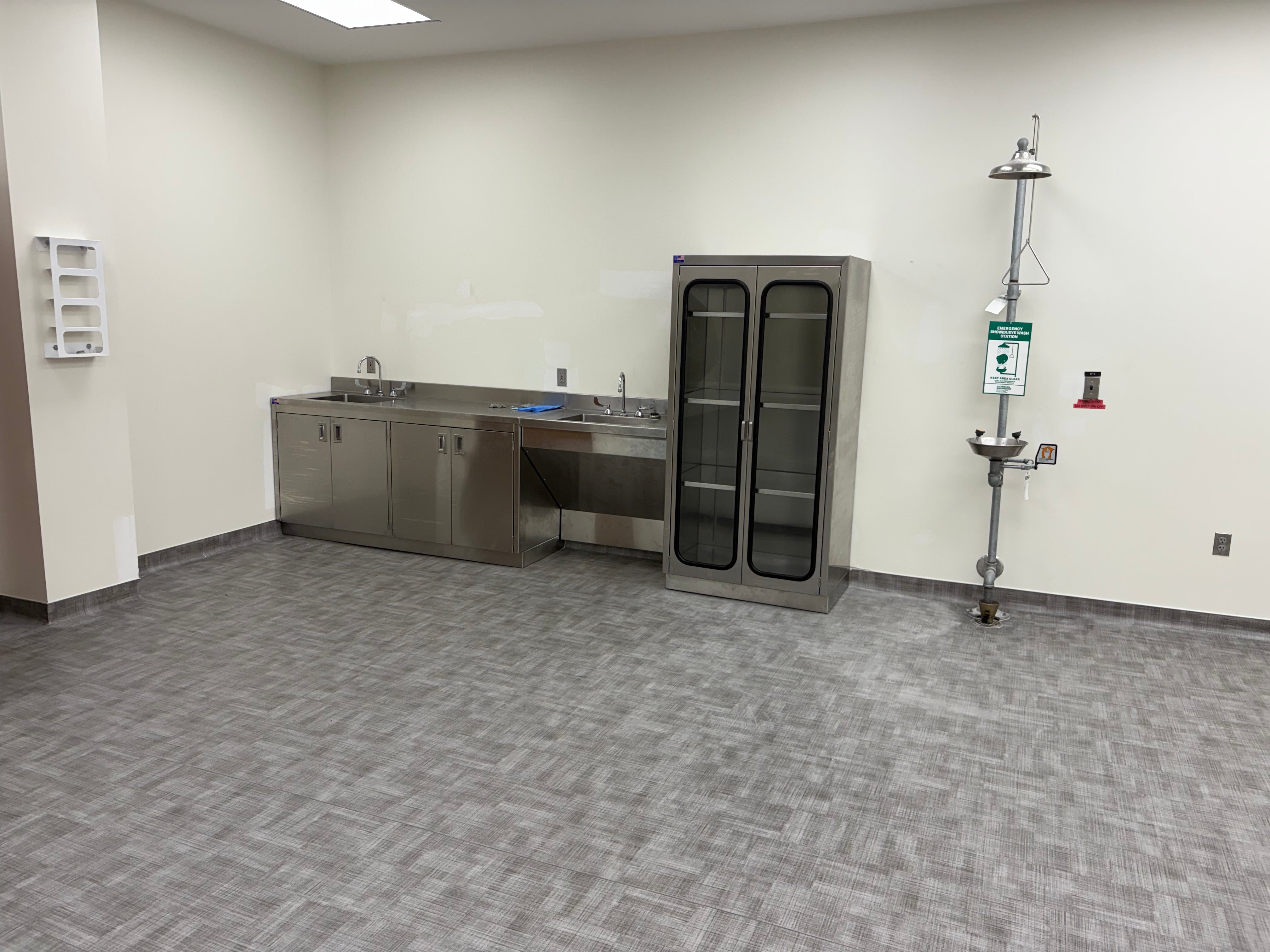 “Modern custom casework cabinetry in a medical laboratory designed for efficiency and organization”