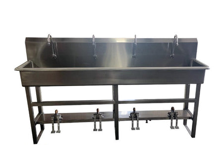 4-station stainless steel foot pedal sink with individual hot, cold, and mixed water valves, USA made.