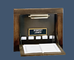 Recessed wall-mounted register desk, folded into the wall.