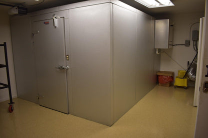 Affordable 10x10 walk-in mortuary cooler with large capacity, providing a cost-effective solution for body storage in busy facilities.