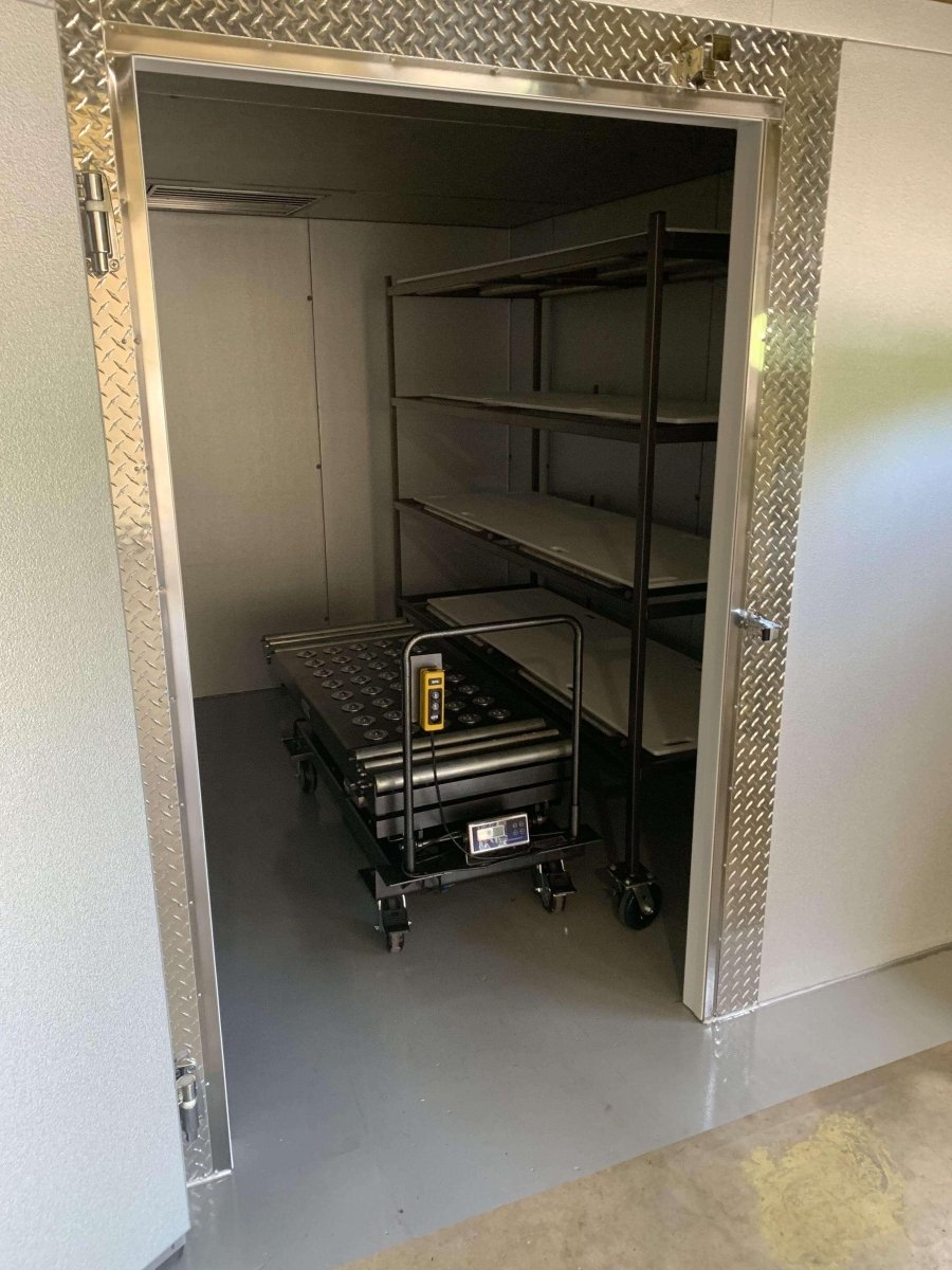 Funeral home cooler with UL-listed insulated wall and ceiling panels