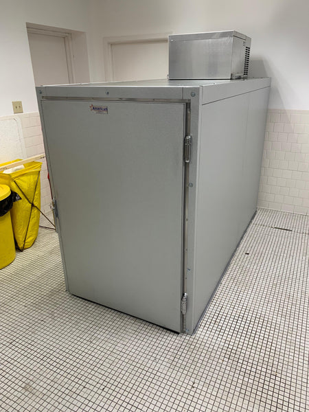 Photo of an oversized cadaver storage cooler, designed for water cremation and aquamation processes.